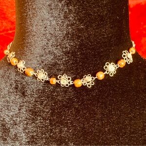 Gold tone wire flowers and wood beaded chocker
